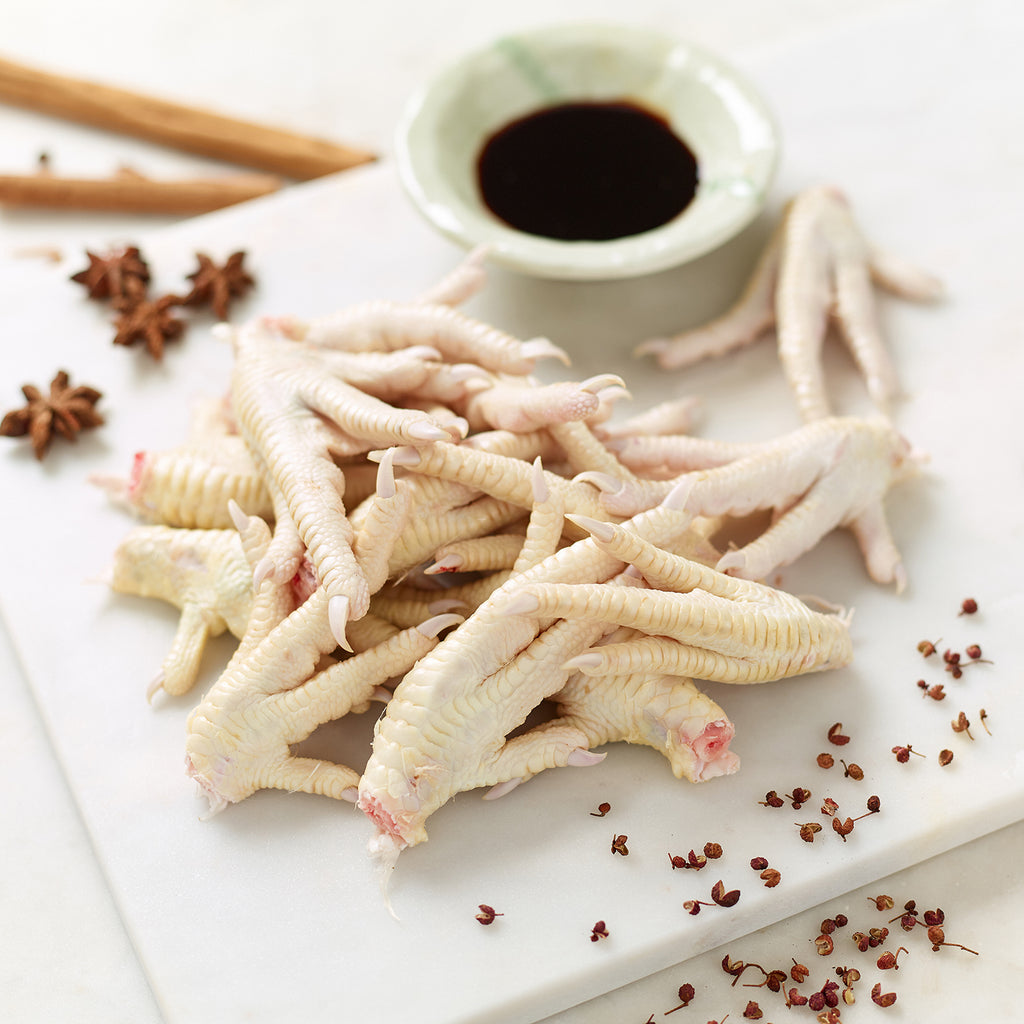 Organic Chicken Feet with soy sauce, star anise, cinnamon sticks and spices